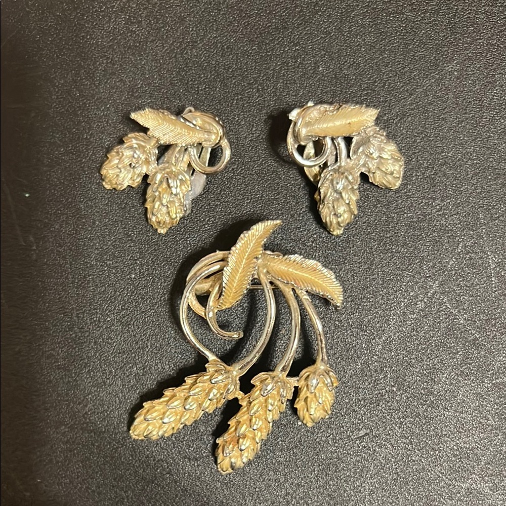 Elegant Gold and Silver Leaf Brooch Set